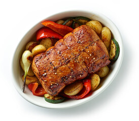 whole roast pork and vegetables