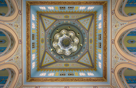 Dubai, UAE - July 14, 2015. Beautiful interior decoration of Jumeirah Mosque Detail of ceiling, lamp and arches. The only mosque in Dubai which is open to the public.