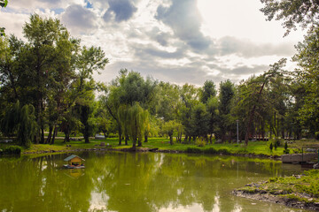 beautiful lake at the evening. Landscape - meadow, the blue sky and river