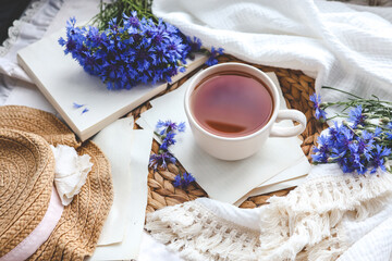 Cup of hot tea and spring home interior. good morning concept