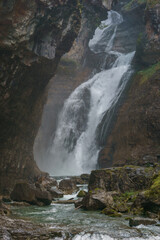 Amazing waterfall Cascada de la Cueva of rio Arazas in the National Park of Ordesa , Aragon, Huesca, Spain