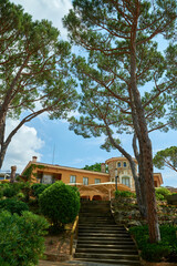 Spanish real estate of Mediterranean seashore. Yard of the beautiful luxury classical spanish villa