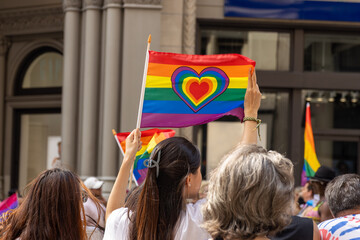 Obraz na płótnie Canvas LGBT pride march. people with rainbow flags