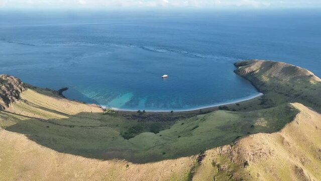 The volcanic island of Gili Banta, not far from Komodo National Park, is surrounded by healthy coral reefs. This beautiful area of Indonesia is known for its astounding marine biodiversity.