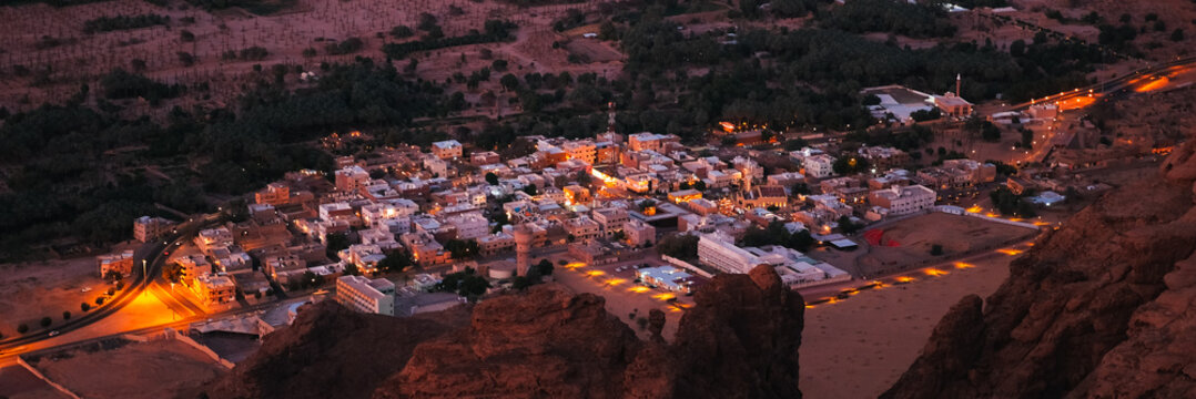 Panoramic view of a town at sunset in Al Ula, Saudi Arabia.