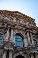 Fototapeta na wymiar Exterior shot of the Louvre Museum in Paris, France
