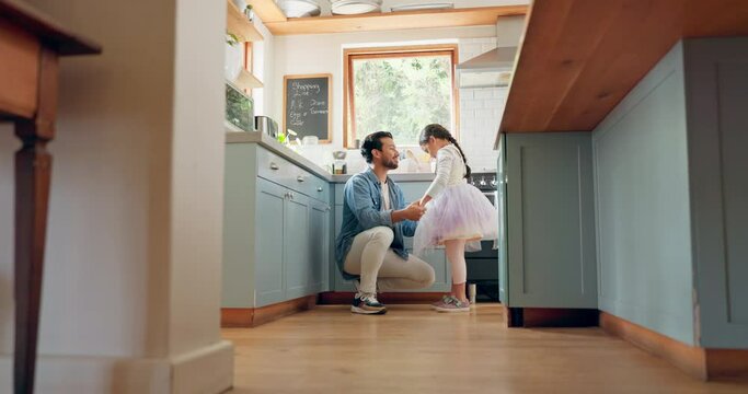 Support, love and ballet girl bonding with father in a kitchen together, excited and playing as a dancer pr ballerina. Tutu, dad and man talking with motivation and happiness for kid in house or home