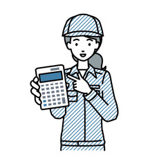 立って電卓を指差してこちらに向けて見せている作業員の女性