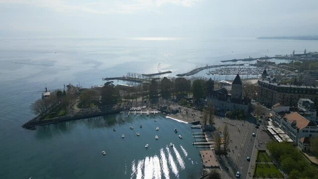 The lakeside of Lake Leman at Lausanne from above - aerial view by drone