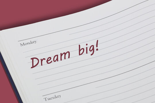 Dream big reminder note in a diary page