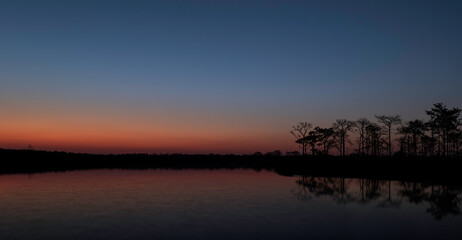 Fototapeta na wymiar sunrise over lake or river. nature landscape in morning.