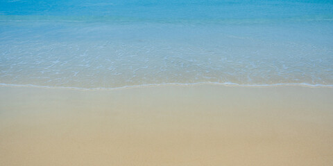 Fototapeta na wymiar Abstract sand of beach and soft ocean wave background
