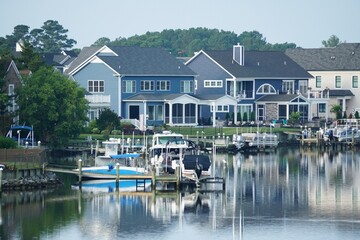 Fototapeta na wymiar The view of the luxury waterfront homes by the bay near Rehoboth Beach, Delaware, U.S.A