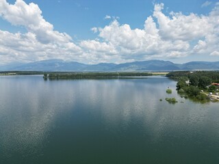The Koprinka dam - massive reservoir (lake) near the town of Kazanlak with the Balkan mountains in the backdrop	