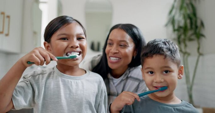Face, mom and children brushing teeth in bathroom for dental wellness, morning routine or healthy habits. Portrait, kids and mother cleaning mouth with toothbrush, self care and fresh breath at home