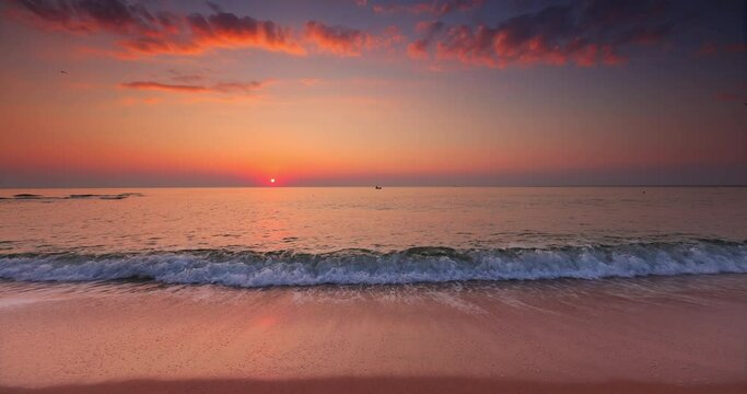 Sunrise over the sea waves and beach, tropical ocean shore destination for relaxation and meditation