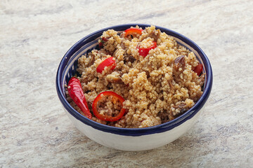 Arabic cous cous with meat and tomato