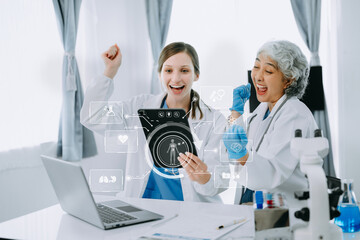 Medical technology network team meeting concept. Doctor hand working with smart phone modern digital tablet and laptop computer with graphics chart interface, with virtual icon diagram..