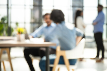 Businessmen blur in the workplace in office with computer or shallow depth of focus of abstract...