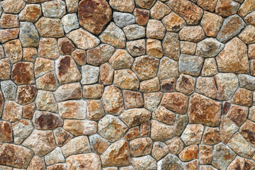 A stone brick wall is a structure constructed by arranging and cementing together individual pieces of stone. Stone bricks are typically cut or shaped to specific dimensions, creating uniform blocks t