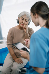 Concerned senior old patient, patient talks with healthcare professional.