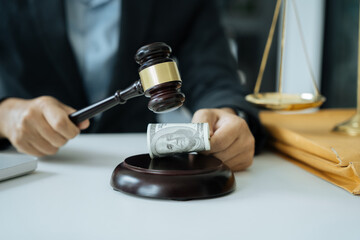 Lawyer accepts money, bribes businessman for partner in corruption in workplace.