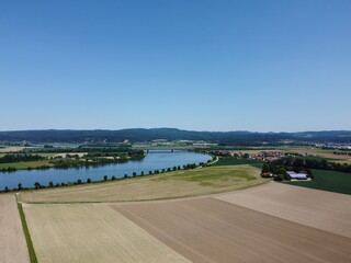 Danube river with dried up fields near Donau and the lock in Geisling,