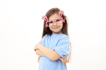 Cute little child girl wearing bunny ears glasses a on Easter day. Easter girl portrait on white background, funny emotions, surprise