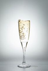 champagne splashing out of a glass