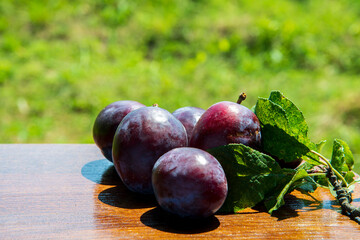 plums on a table