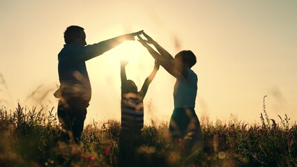 hold hands family sunset. depict sign roof house. happy family buy housing apartment. dream house...