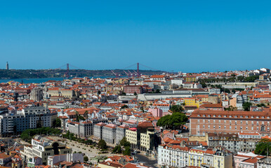 Naklejka na ściany i meble Lisbon. Portugal- 07.09.2023. Panoramic view of the capital from Alfama with a view of the 25th April Bridge.