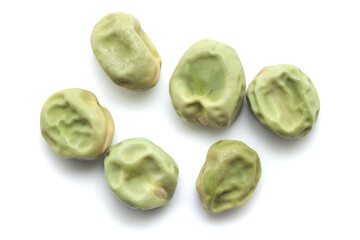 Close-up of Dried Green Peas  (Pisum sativum) seeds isolated on white background. Top view.