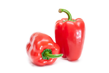 Two Fresh Red Sweet Bell Peppers Isolated on White Background