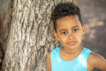 Close up portrait of a young beautiful african boy