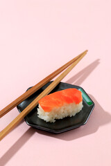 Nigiri Salmon Sushi on Pink Table
