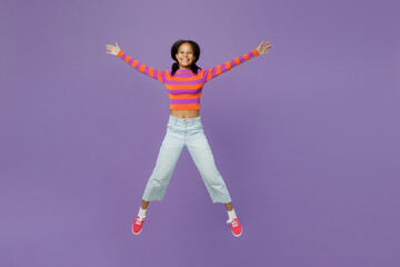Full body cool excited happy little kid teen girl 15-16 year old wear striped orange sweatshirt...
