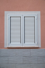 Traditional window shutters as blinds close up,Italy