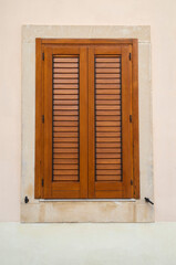Traditional window shutters as blinds close up,Italy