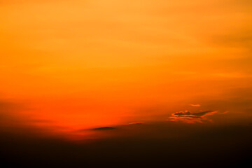Eternal Radiance: Fiery Orange Colorful Sunset Sky - A Beautiful Sky of Hope and Happiness Concept Idea Background.