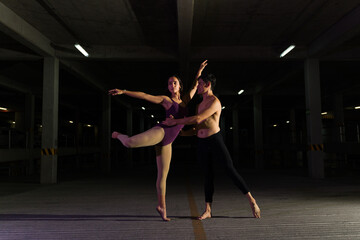 Artistic couple dancing and doing a ballet dance performance