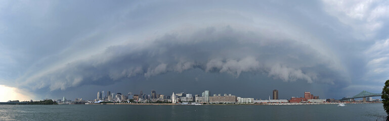 Panorama of a scary supercell thunderstorm with rollcloud over Montreal city, Quebec, Canada