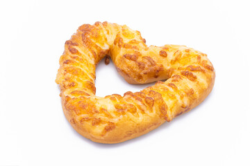 heart shaped bread with mayonnaise  on white background closeup