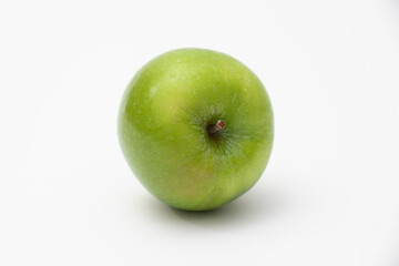 Green apple on white background. Vegetable is heathly food for diet can make a smoothies and salad.