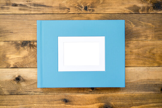 Photo album with leather hardcover and frame for design and personalization