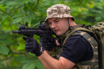 Fototapeta premium Close-up of a lightly armed soldier