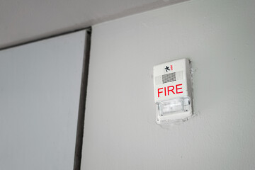 Auto-detection fire alarm device which is install on building wall. Emergency safety equipment...