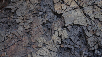 Basalt volcanic rock with cracks