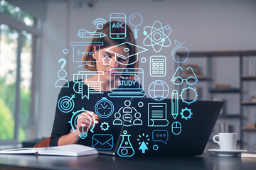 Pensive attractive beautiful businesswoman studying on laptop at university library in background. Notebook, table. Concept of distant business education, internet surfing, information technology.