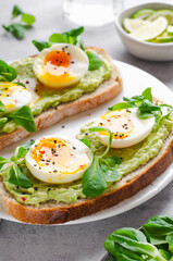 Fototapeta na wymiar Avocado Egg Toast, Healthy Snack or Breakfast on Bright Background
